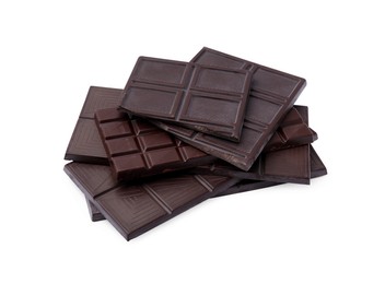 Photo of Pieces of delicious dark chocolate bars isolated on white
