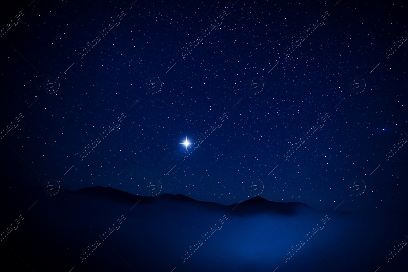 Image of Mountains under beautiful starry sky at night