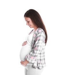 Happy pregnant woman posing on white background