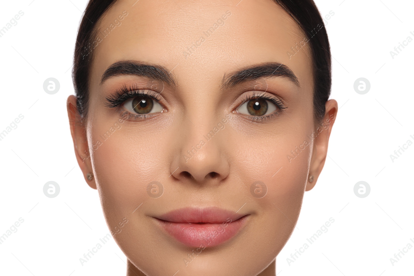 Photo of Beautiful young woman showing extended and ordinary eyelashes on white background, closeup