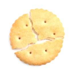 Photo of Crispy broken cracker isolated on white, top view