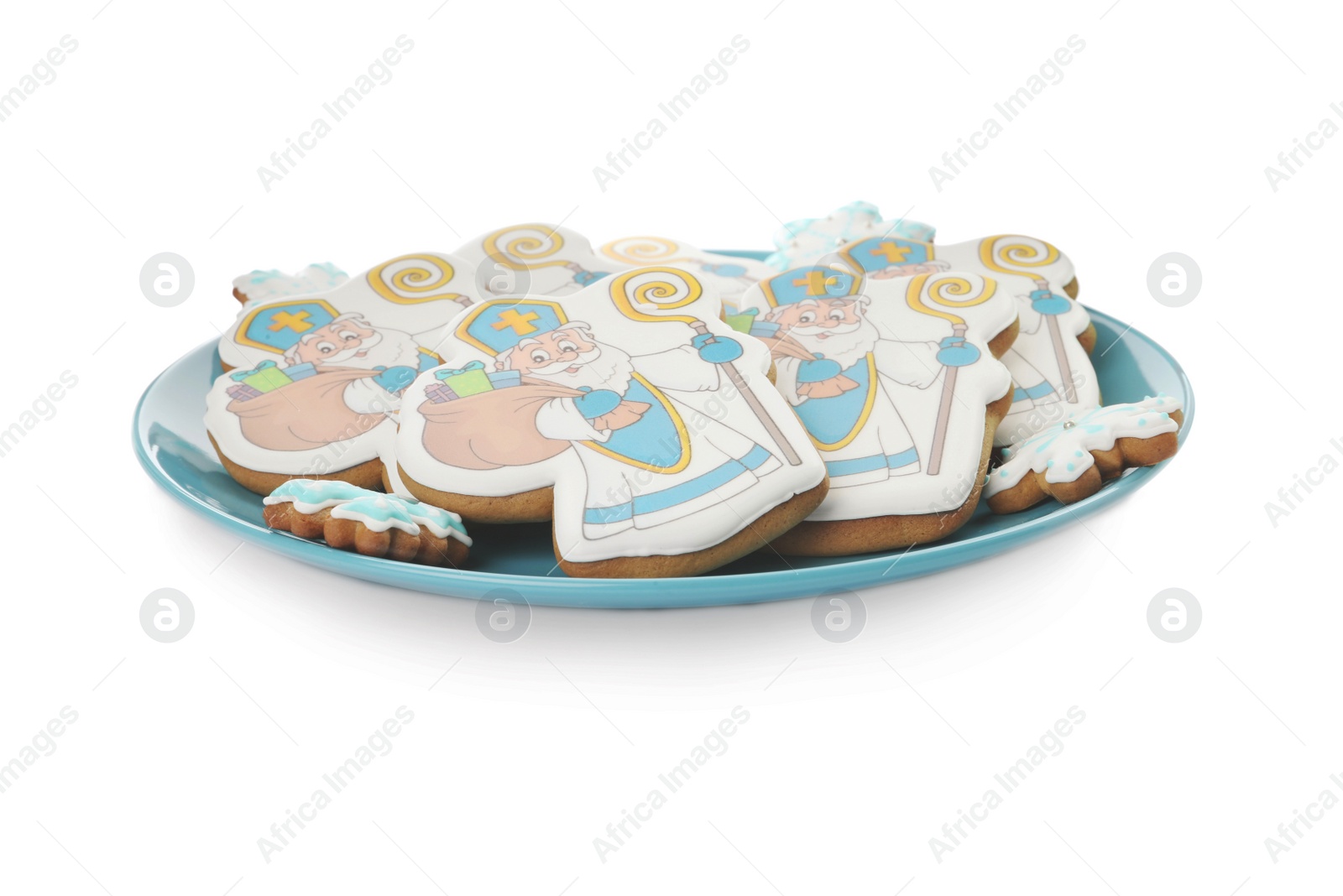 Photo of Tasty gingerbread cookies on white background. St. Nicholas Day celebration