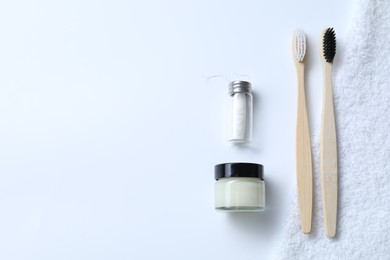 Bath accessories. Flat lay composition with personal care products on white background, space for text