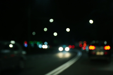 Photo of Blurred view of city at night. Bokeh effect