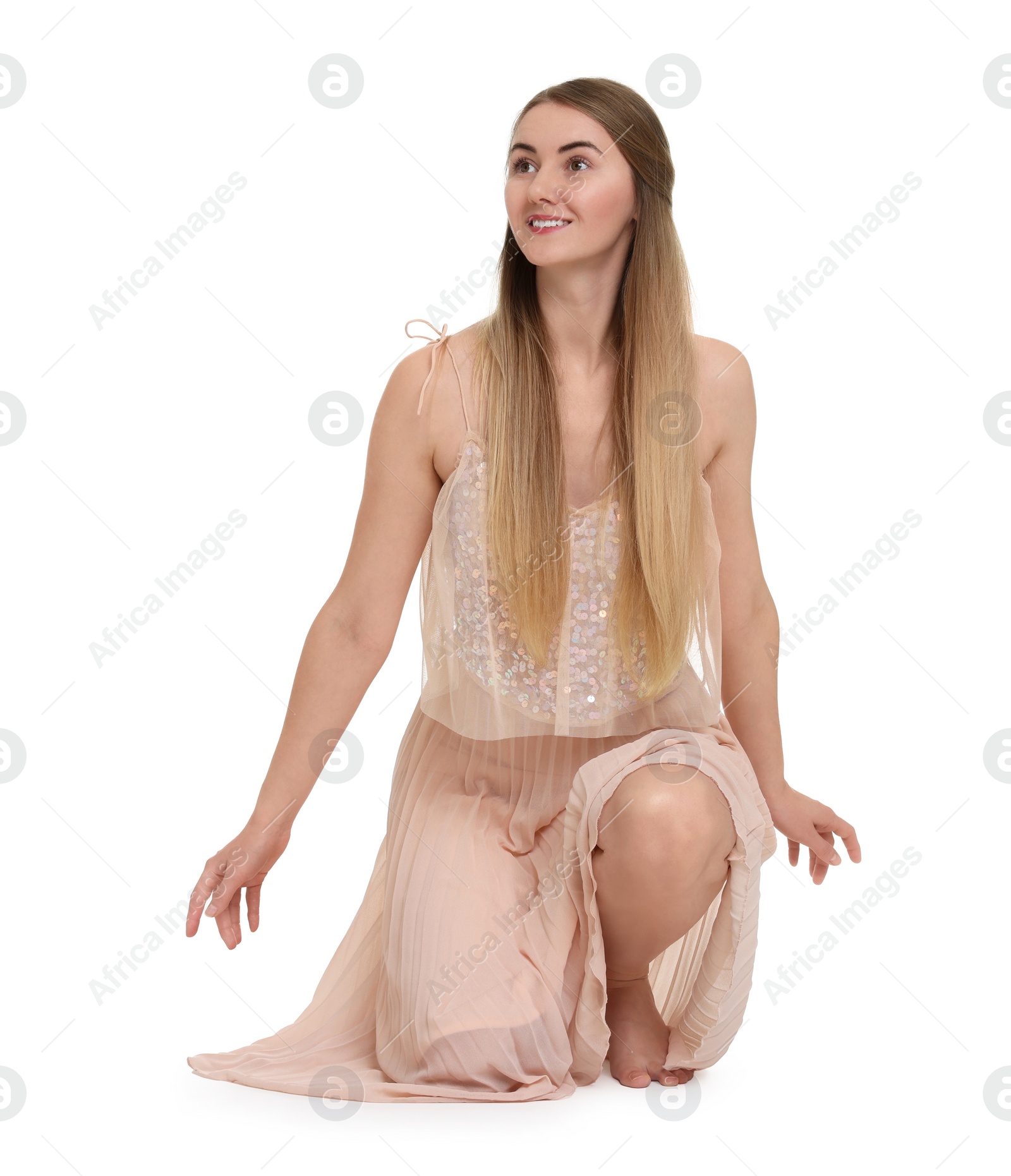 Photo of Beautiful girl in beige dress on white background