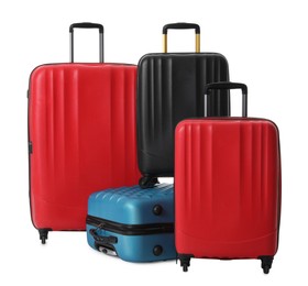 Modern suitcases for travelling on white background