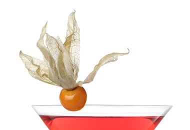 Refreshing cocktail decorated with physalis fruit on white background, closeup