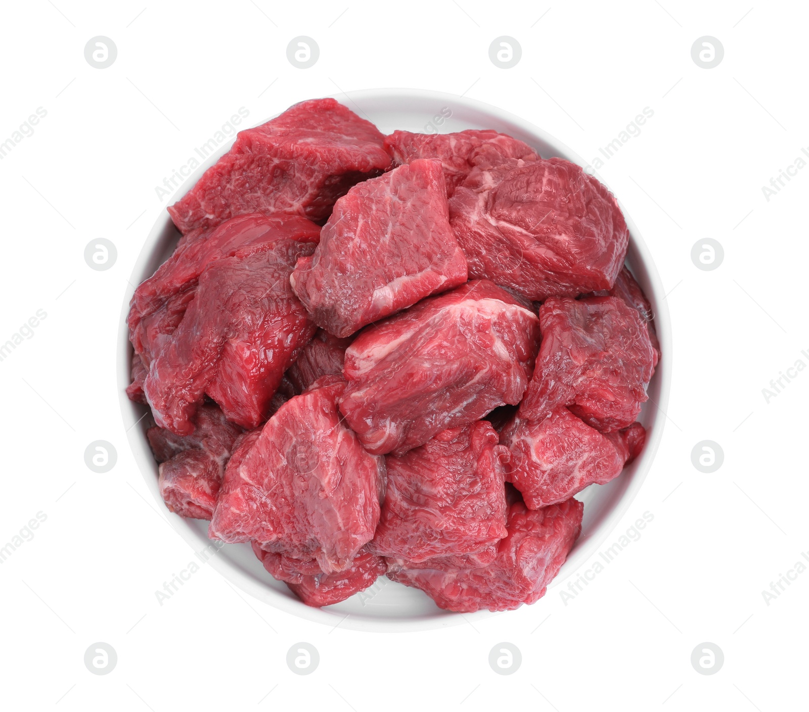 Photo of Pieces of raw beef meat isolated on white, top view