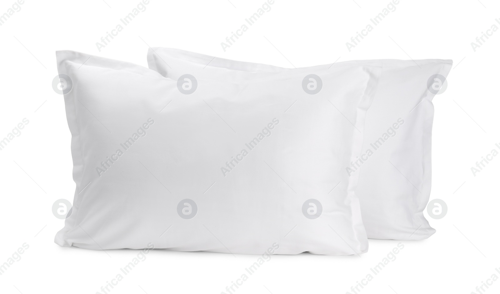 Photo of Two new soft pillows isolated on white