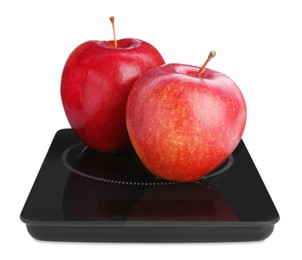 Photo of Modern kitchen scale with fresh red apples isolated on white