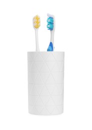 Two plastic toothbrushes in holder isolated on white