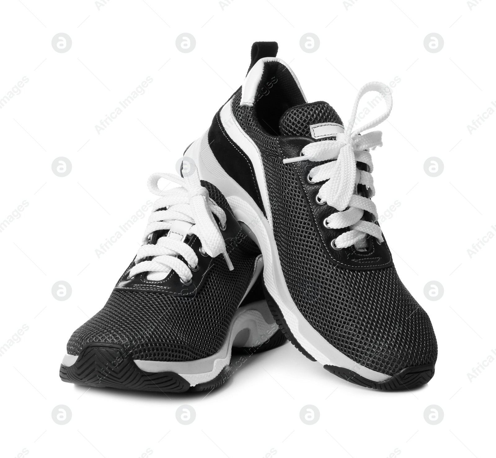 Photo of Pair of stylish modern training shoes on white background