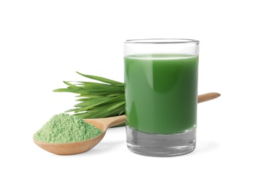 Photo of Glass of wheat grass juice, spoon with powder and sprouts on white background