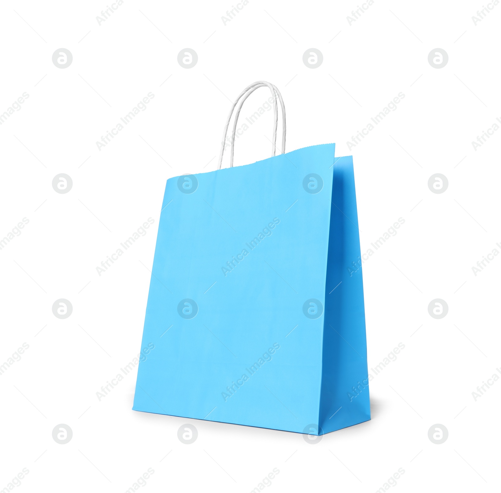 Photo of Light blue gift paper bag on white background
