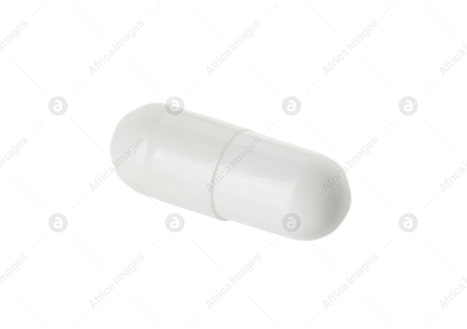 Photo of One vitamin capsule isolated on white. Health supplement