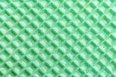 Photo of Tasty wafer as background, closeup. Crispy food