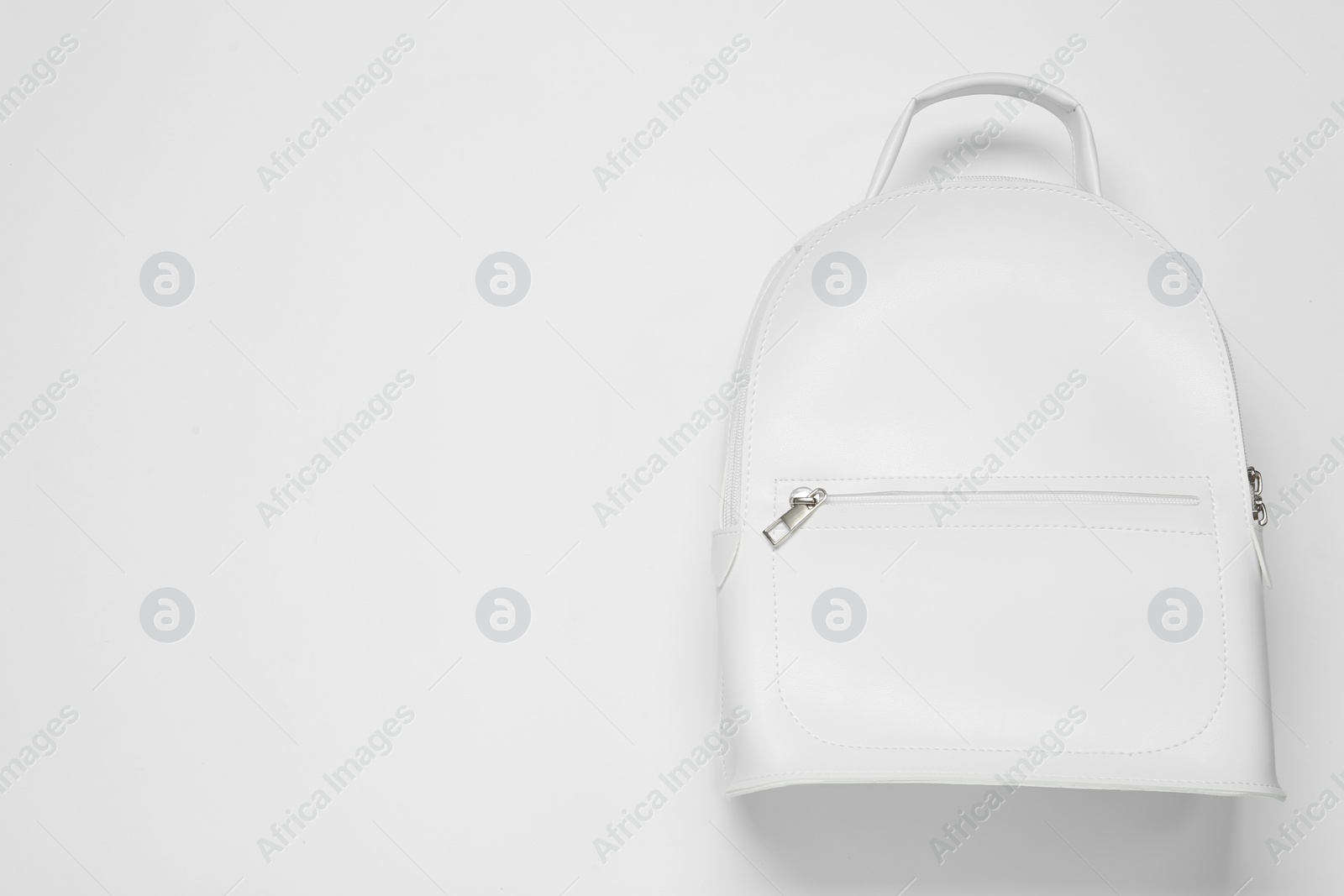 Photo of Stylish urban backpack on white background, top view