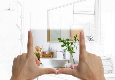 Image of Man showing frame gesture and making bathroom real out of drawing