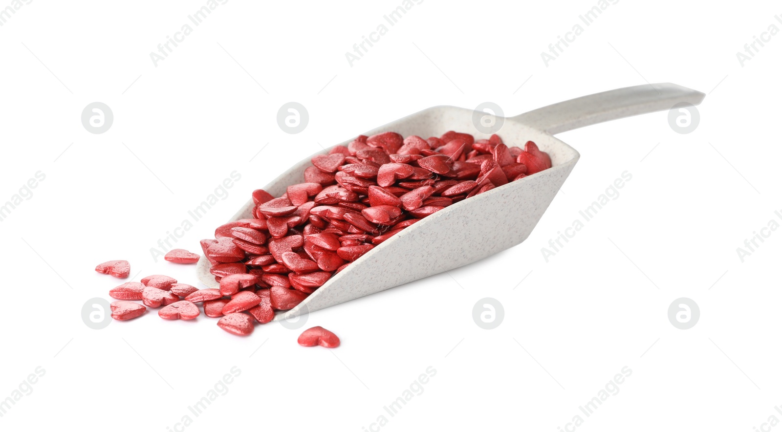 Photo of Bright heart shaped sprinkles in scoop on white background