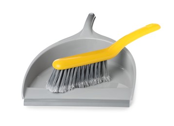 Photo of Plastic hand broom and dustpan isolated on white