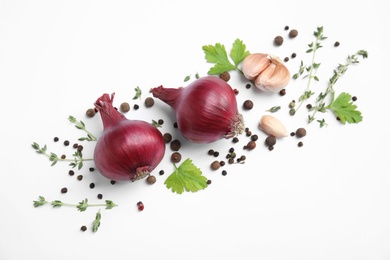 Beautiful composition with ripe red onions on white background