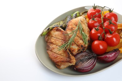 Photo of Plate with tasty grilled vegetables, meat, fresh cherry tomatoes and rosemary isolated on white