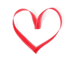 Photo of Heart made of red ribbon on white background, top view