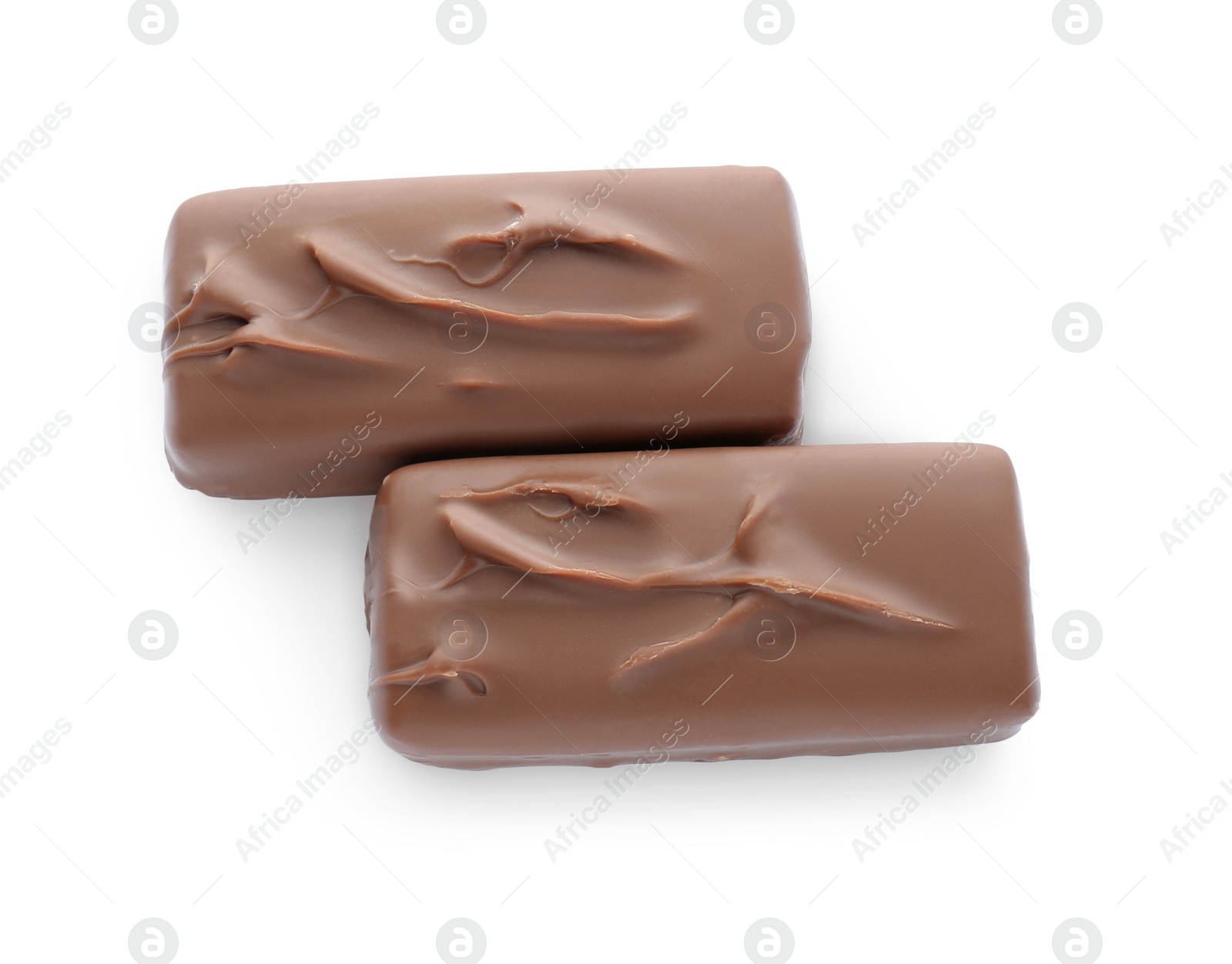 Photo of Tasty chocolate bars on white background, top view