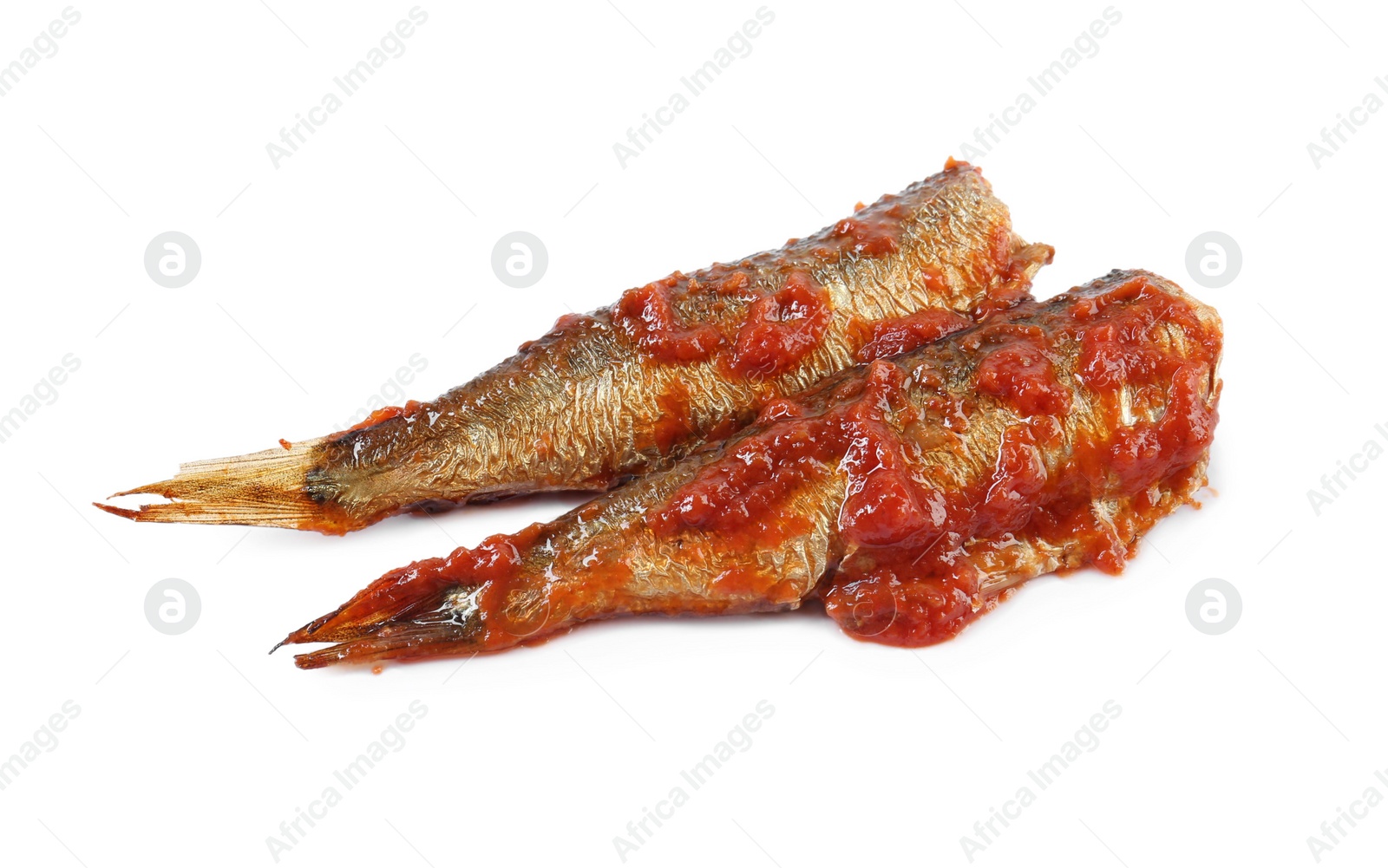 Photo of Tasty canned sprats with tomato sauce isolated on white