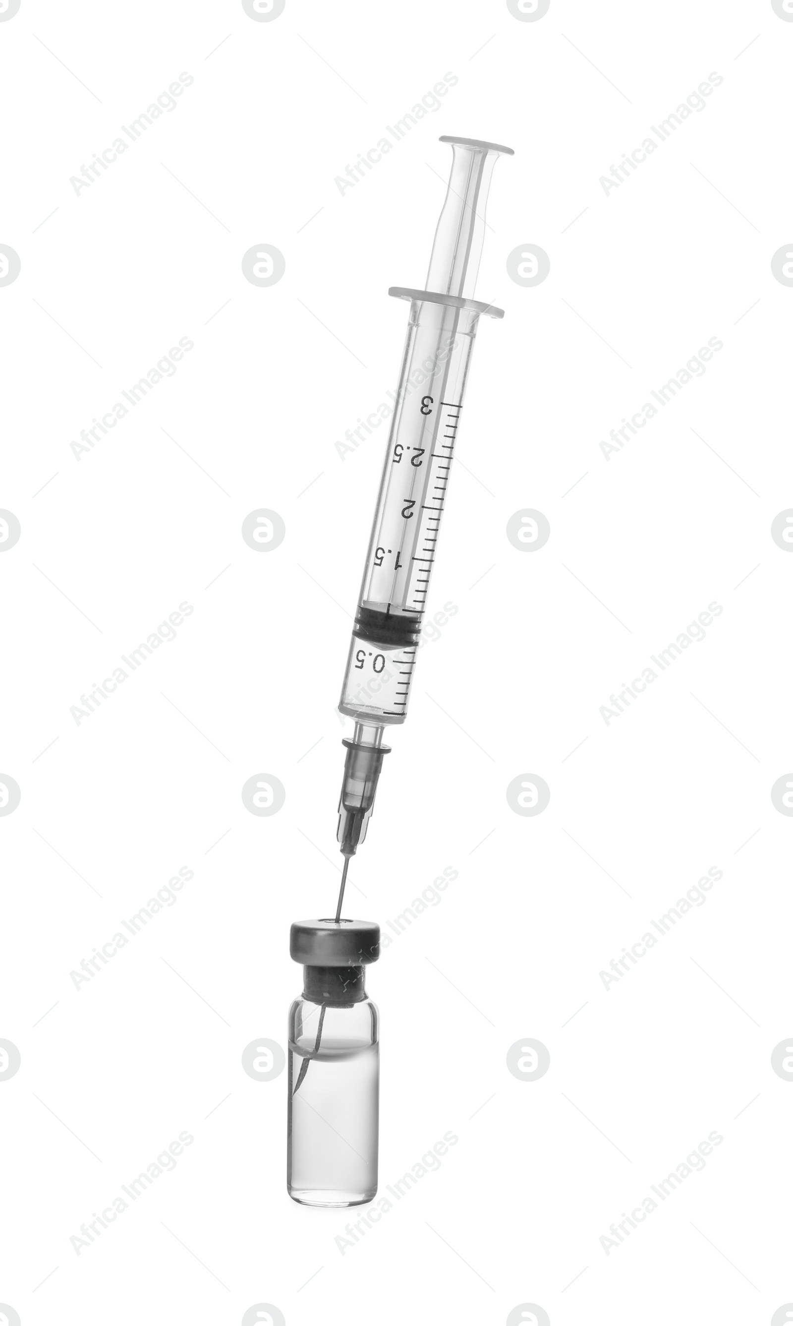 Photo of Syringe with vial of medicine isolated on white