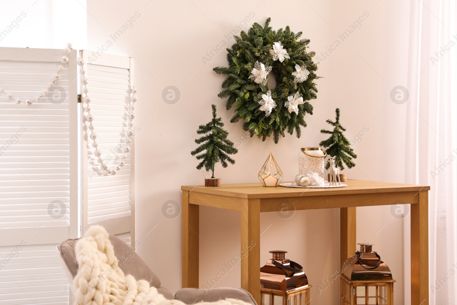 Photo of Beautiful Christmas decor in contemporary room. Interior design