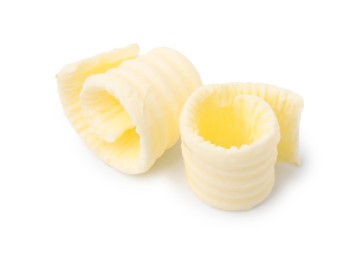 Photo of Fresh tasty butter curls isolated on white