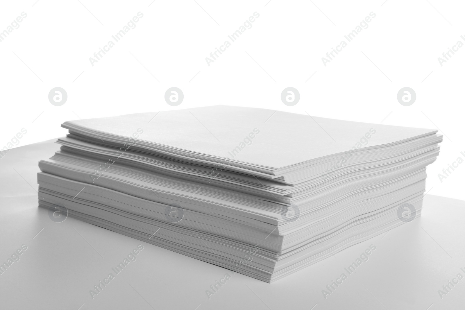 Photo of Stack of blank papers on white background