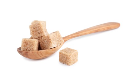 Brown sugar cubes and spoon on white background