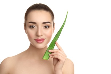 Photo of Young woman with aloe vera leaf on white background