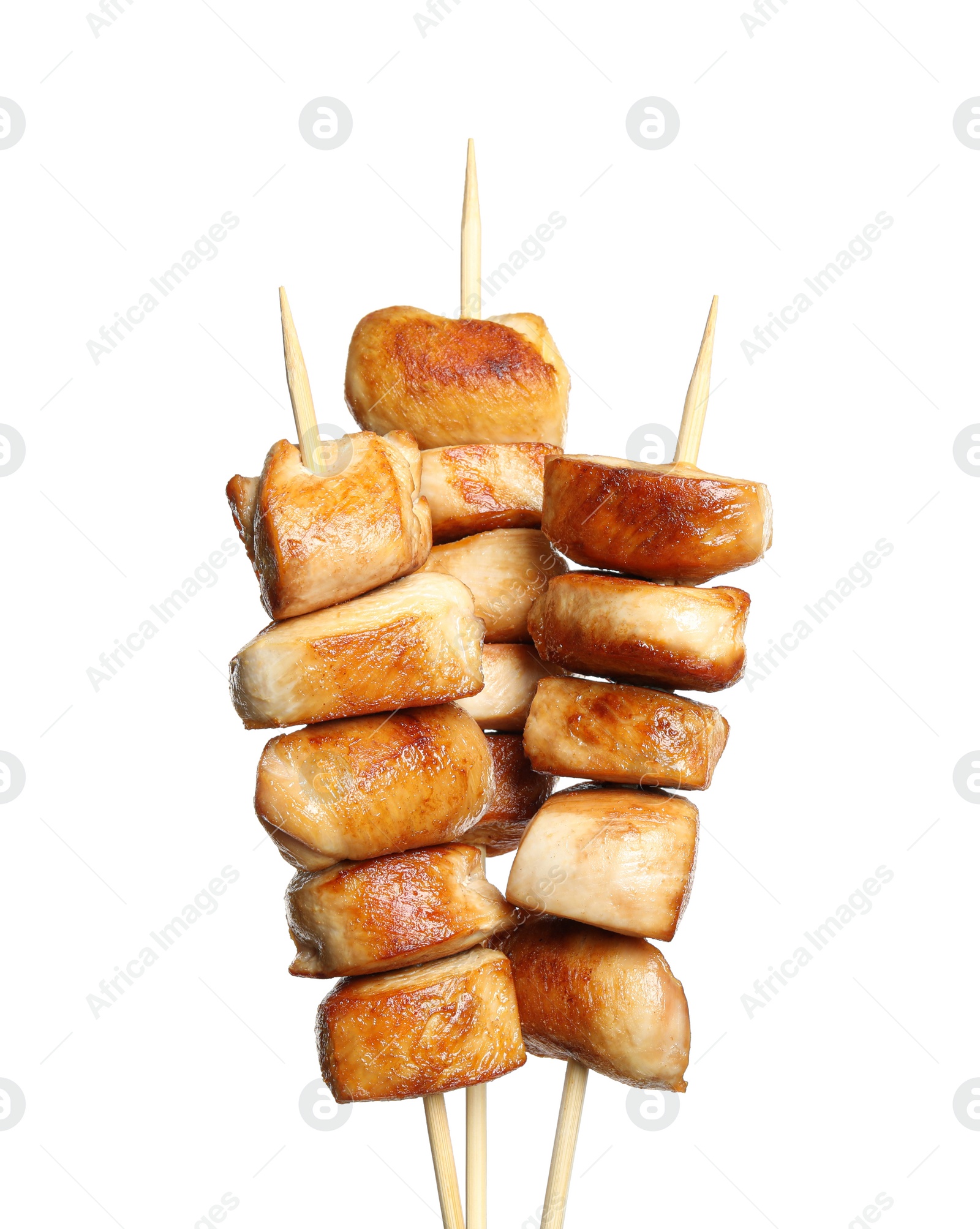 Photo of Delicious chicken shish kebabs on white background