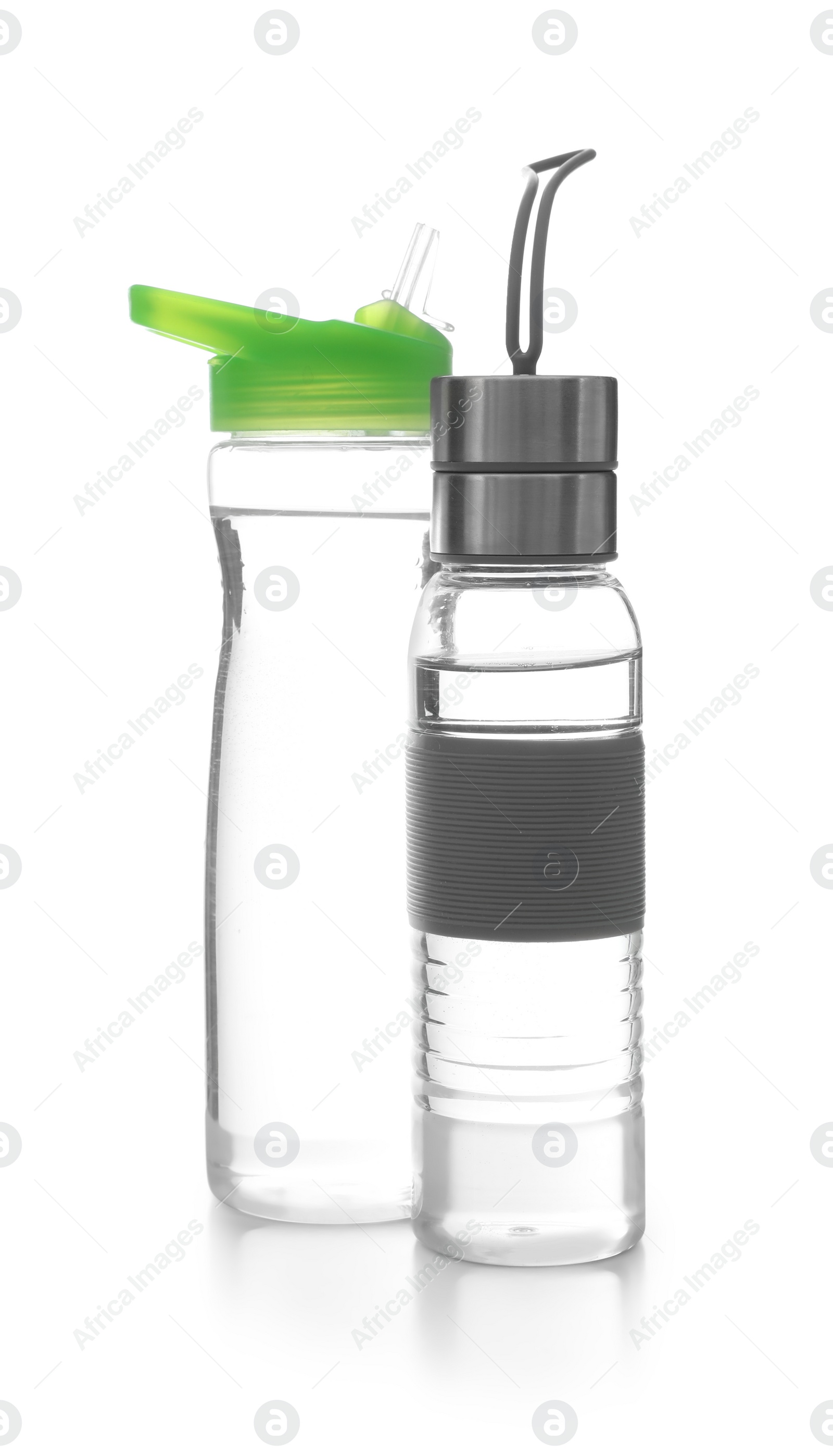 Photo of Different water bottles for sports on white background