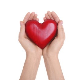 Photo of Woman holding decorative heart in hands on white background, closeup