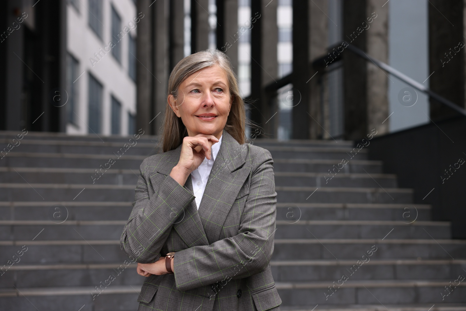 Photo of Portrait of beautiful woman outdoors. Lawyer, businesswoman, accountant or manager