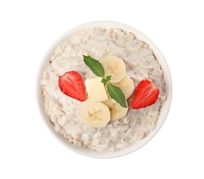 Tasty boiled oatmeal with banana and strawberry in bowl isolated on white, top view