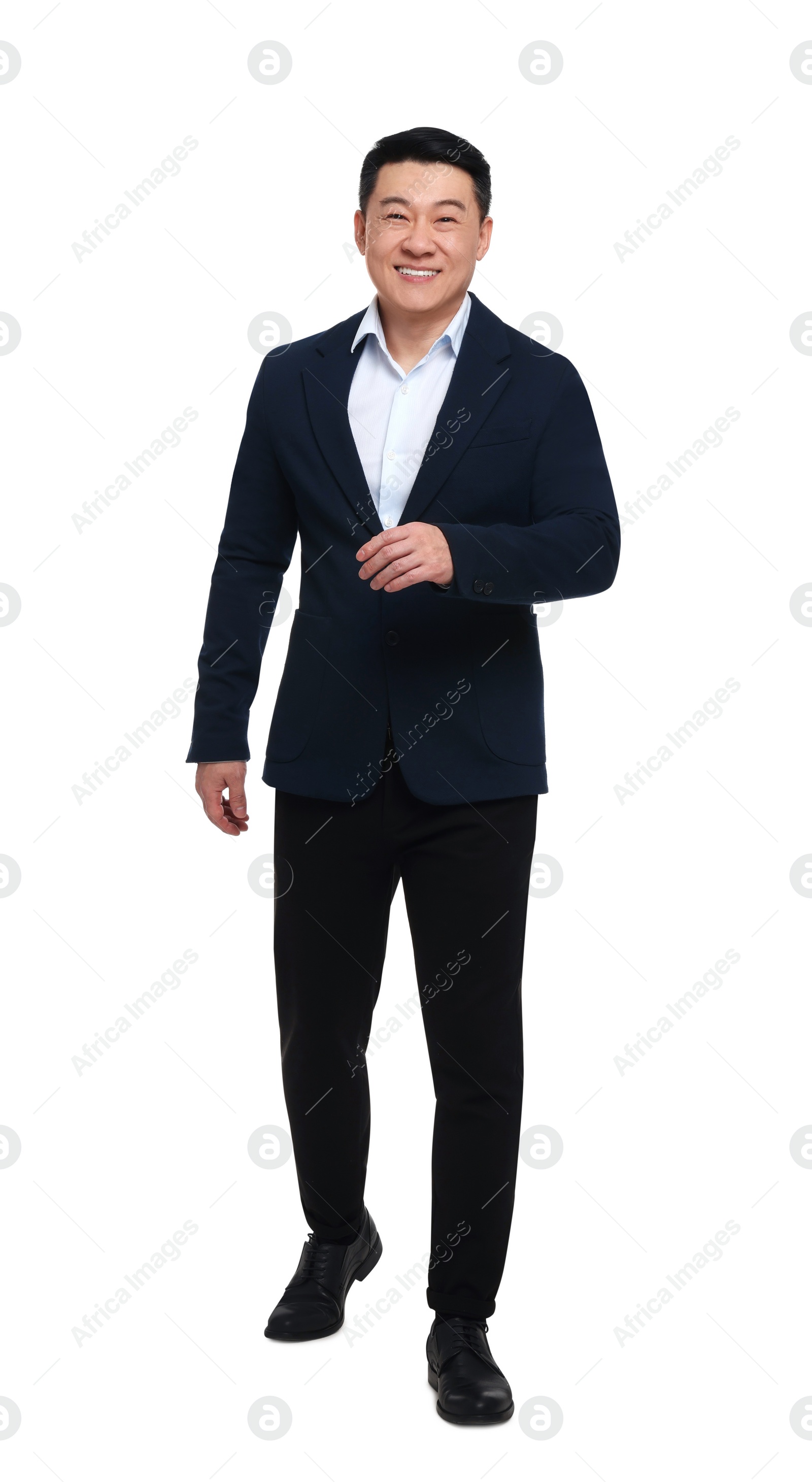 Photo of Businessman in suit posing on white background