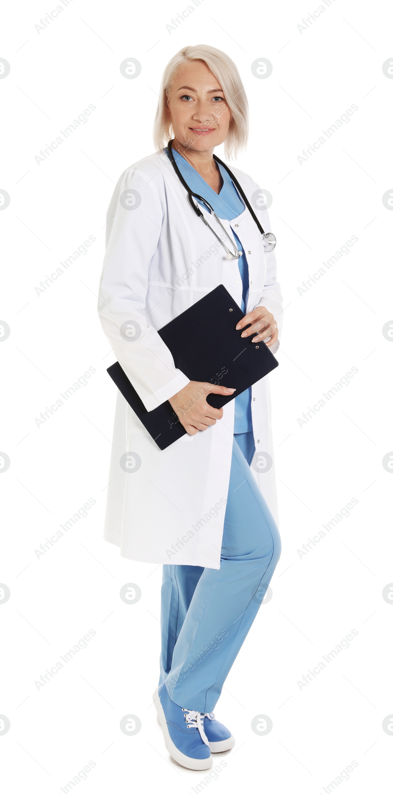 Photo of Full length portrait of female doctor with clipboard isolated on white. Medical staff