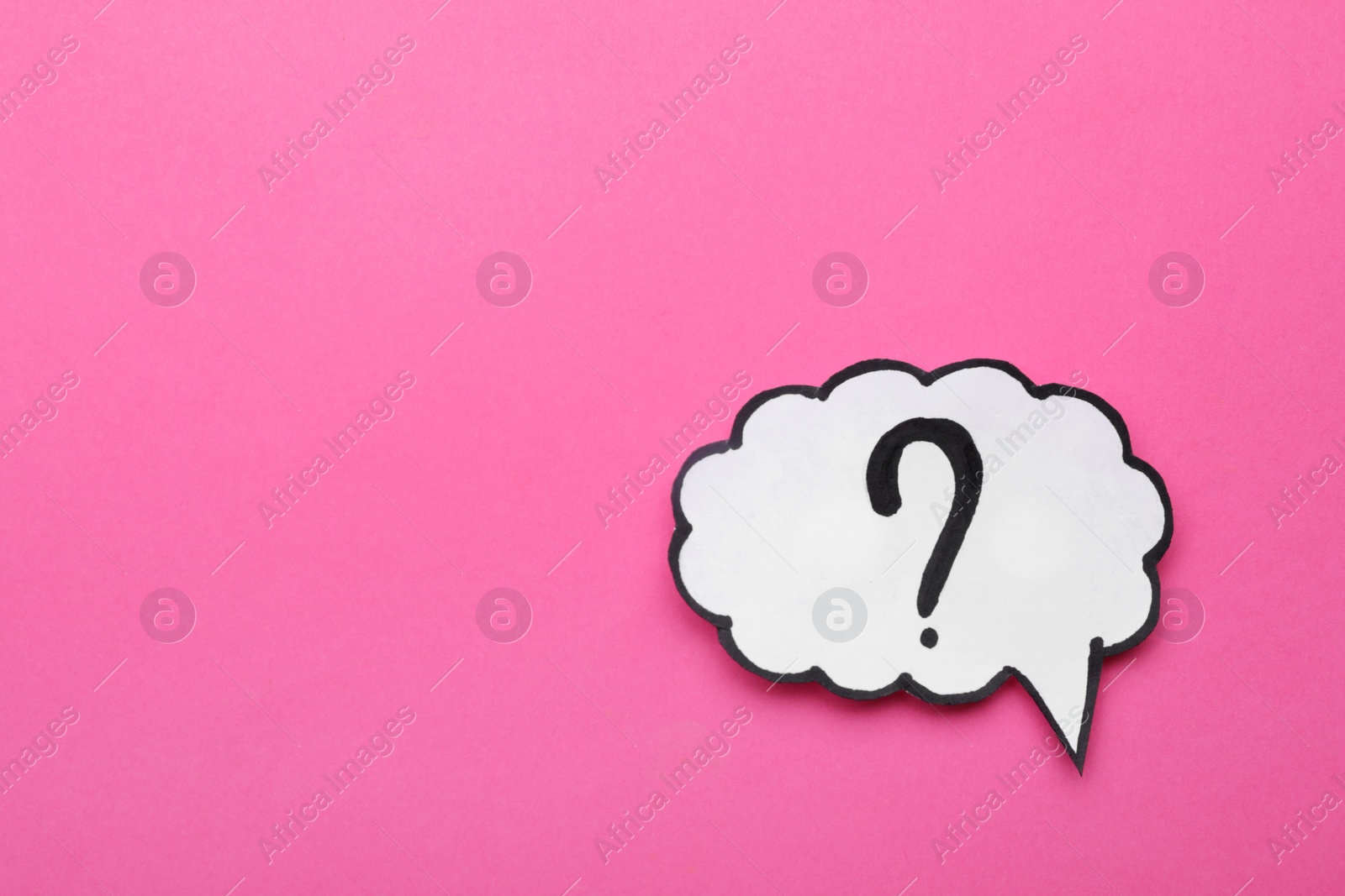 Photo of Paper speech bubble with question mark on pink background, top view. Space for text