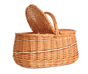 Empty wicker picnic basket isolated on white