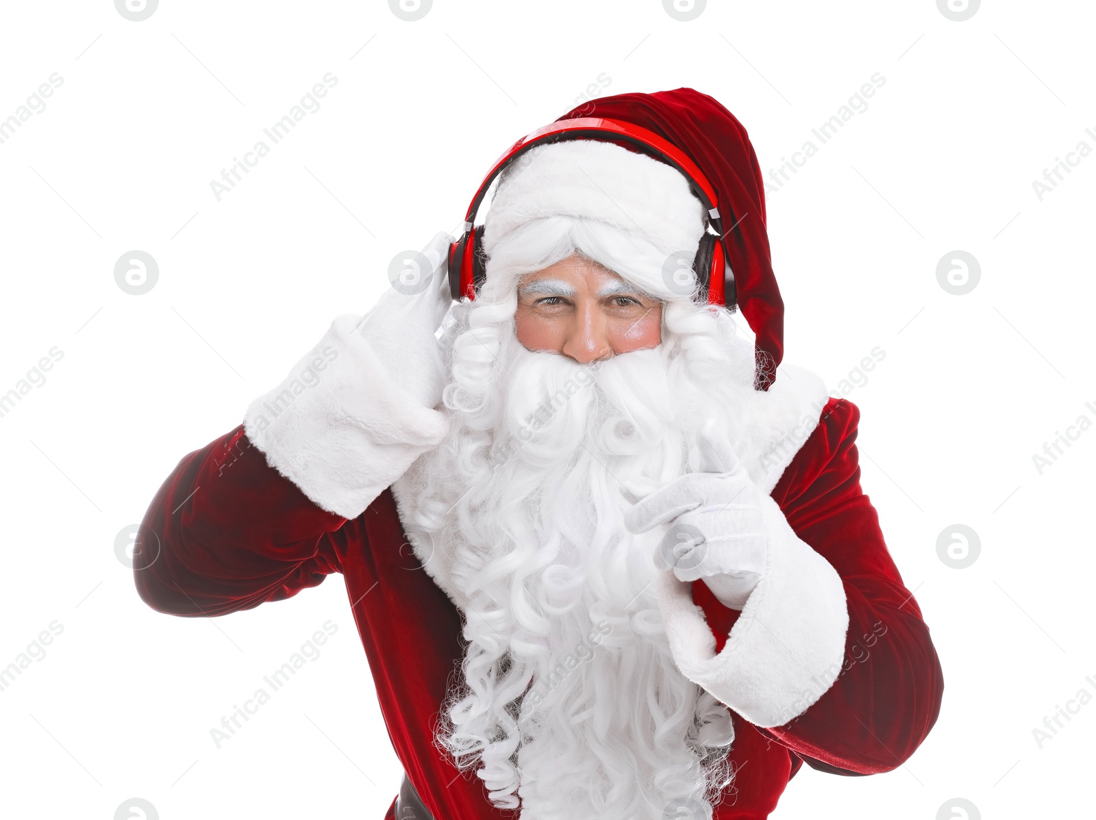 Photo of Santa Claus with headphones listening to Christmas music on white background