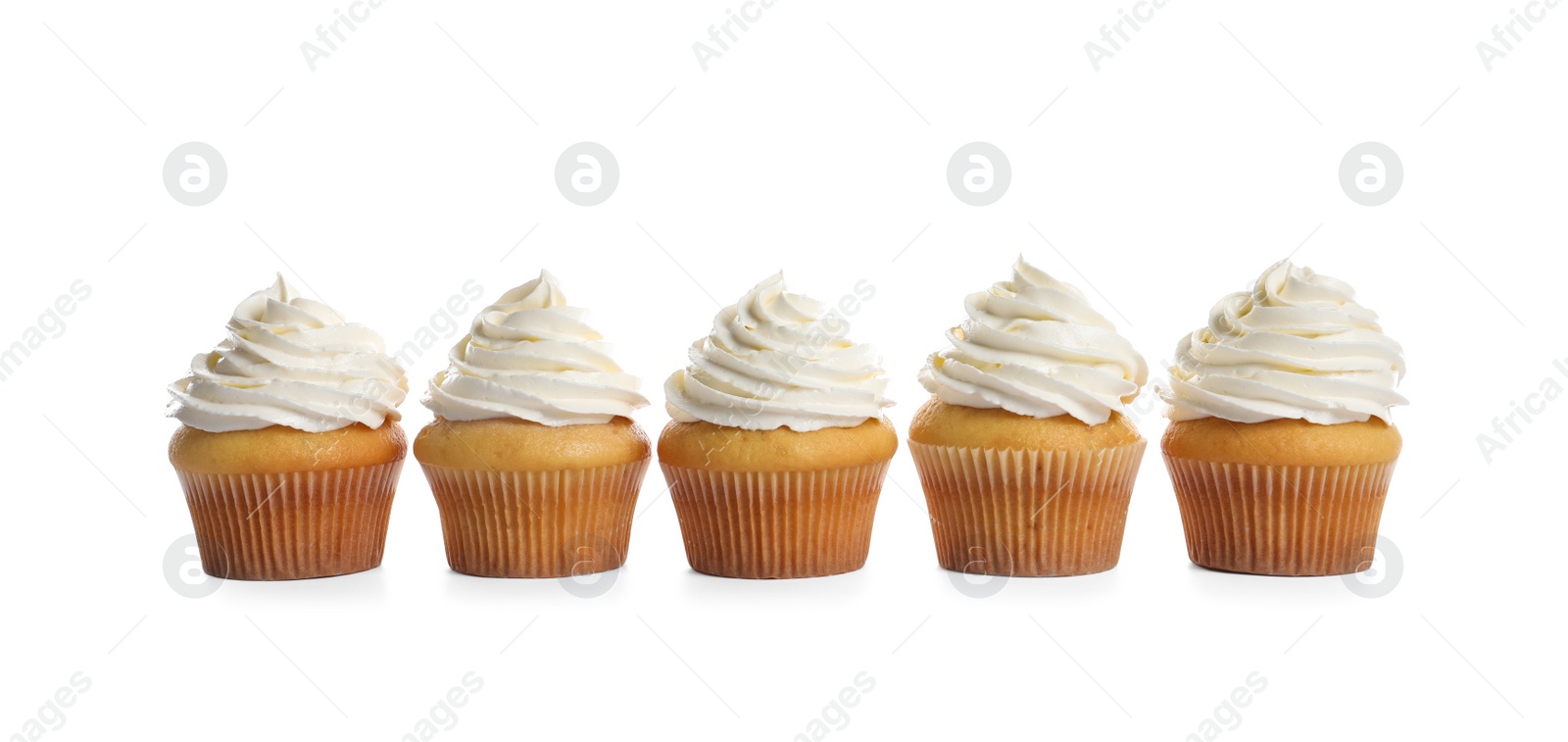 Photo of Delicious cupcakes decorated with cream on white background