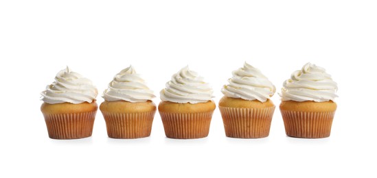 Photo of Delicious cupcakes decorated with cream on white background