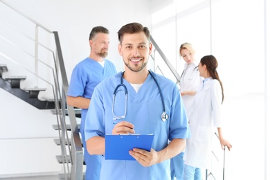 Photo of Doctors and medical assistants in clinic. Health care service