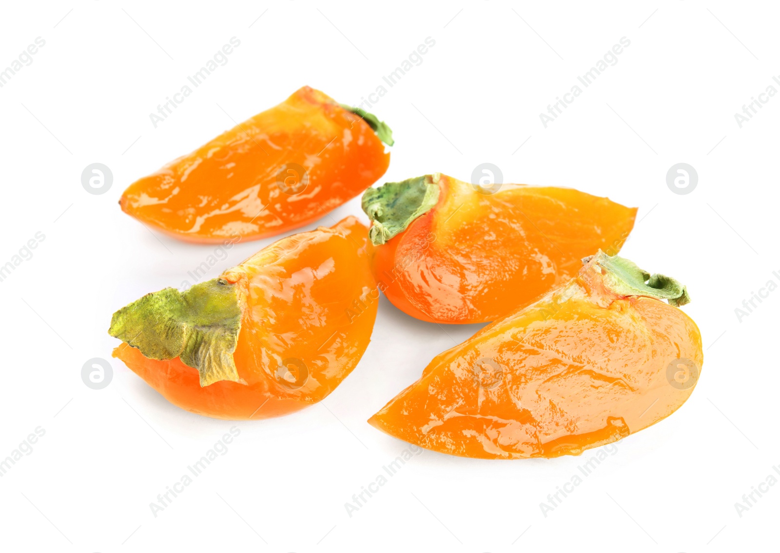 Photo of Slices of delicious persimmon isolated on white
