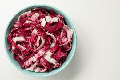 Cut radicchio on white background, top view